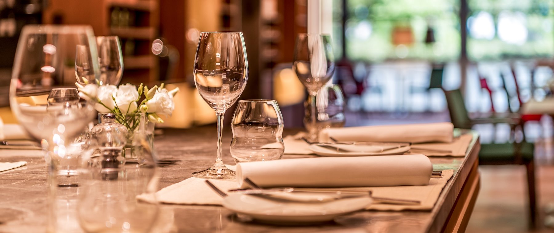 Staff member with champagne bottle