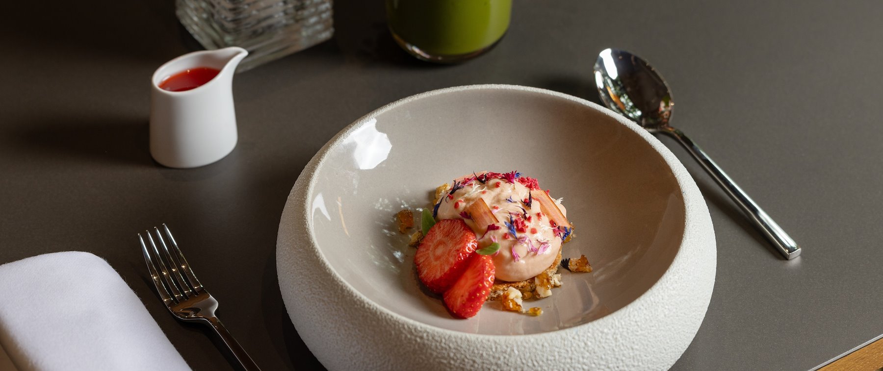 Staff member with champagne bottle